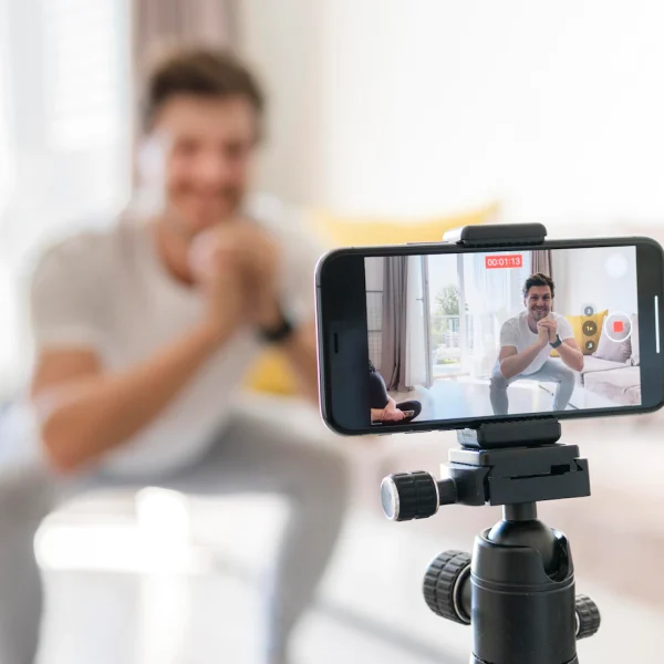 personal-trainer-recording-exercises-home_23-2148581821-600x600